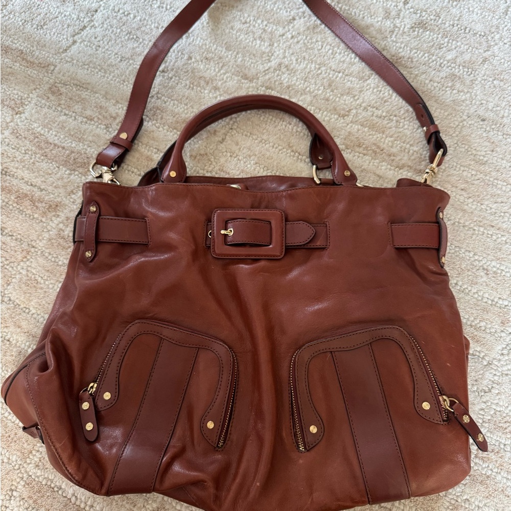 Cole Haan Brown Travel Bag with  Leather and Detachable Strap.